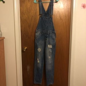 Full length ripped jean overalls
